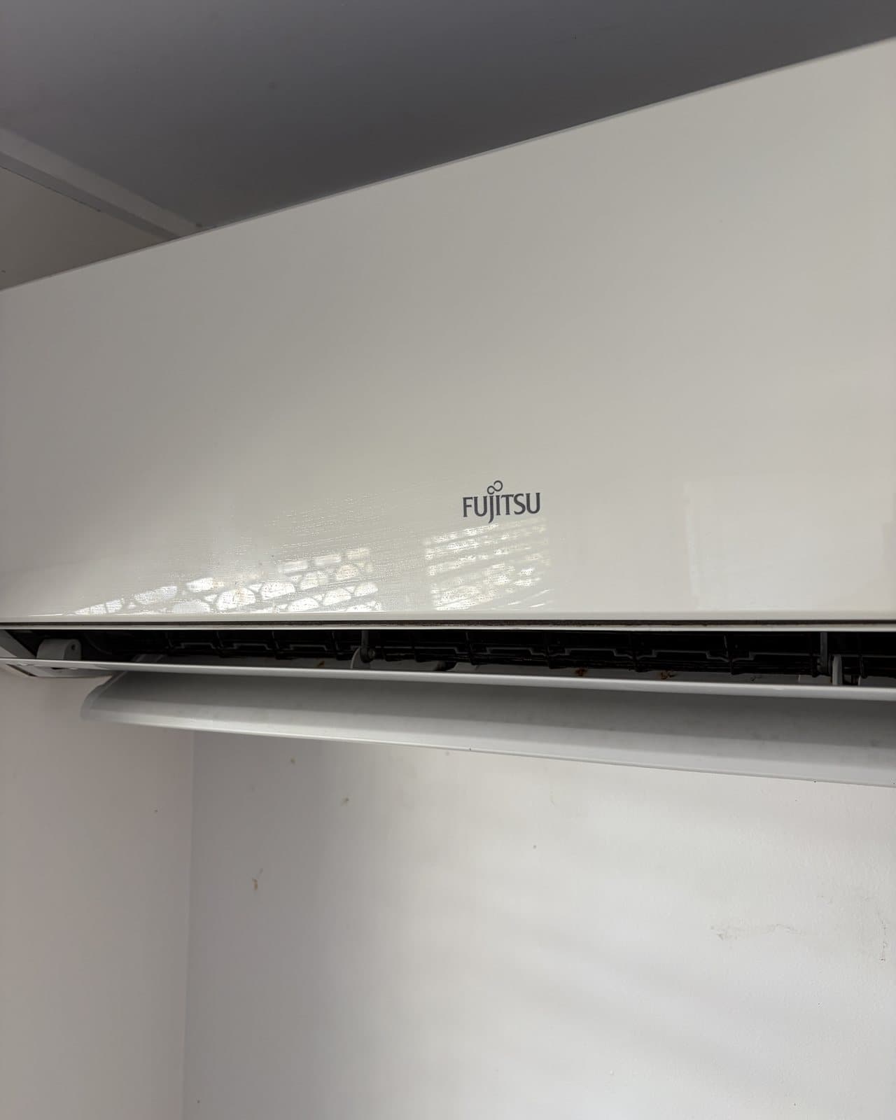 The same split system after the clean, white and closed up